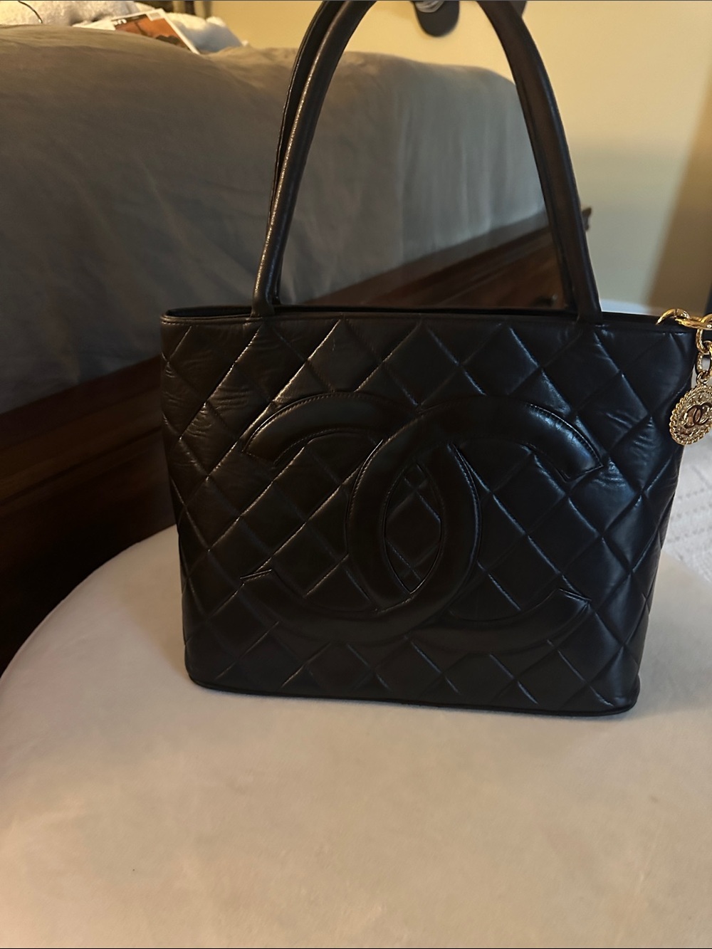VINTAGE CHANEL! Black Quilted Chanel Leather Tote Bag with Interlocking Logo.
